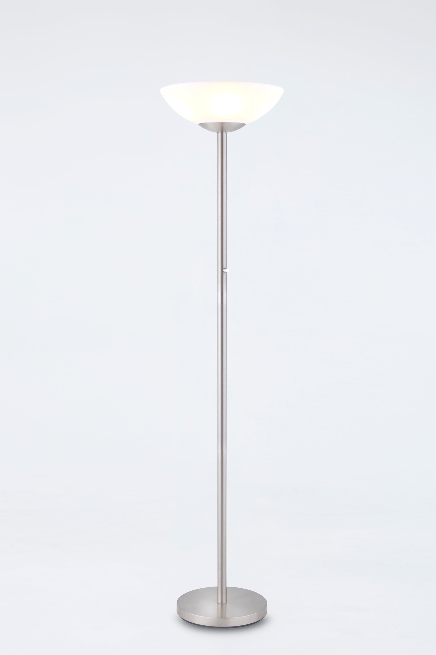 Floor lamp with a white shade on a light gray background
